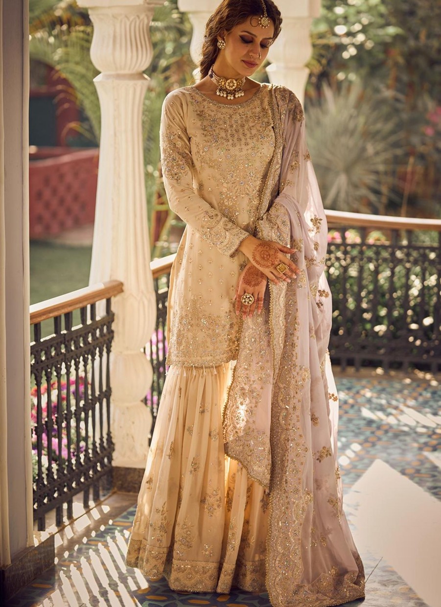 Women Lashkaraa | Cream And Lavender Embroidered Gharara Suit